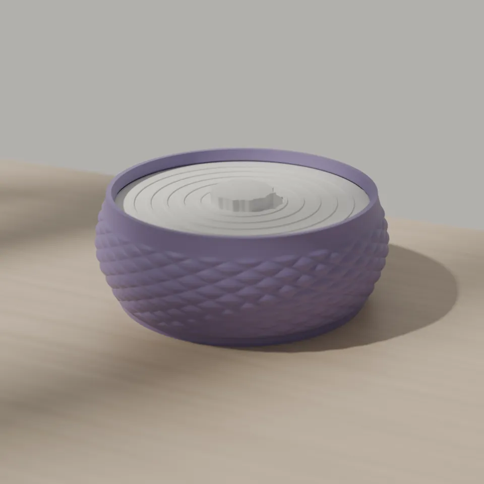 Quilted storage bowl with its lid on, shown in Lilac.